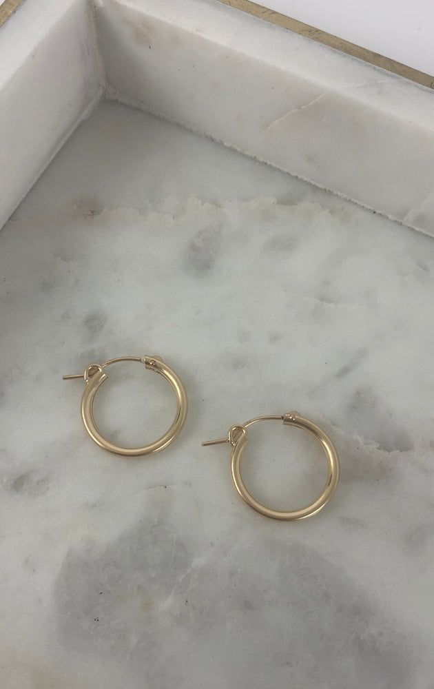 
                  
                    Gold Filled Hälō Hoop Earrings
                  
                