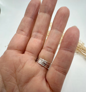 
                  
                    Sterling silver dainty stacker ring
                  
                