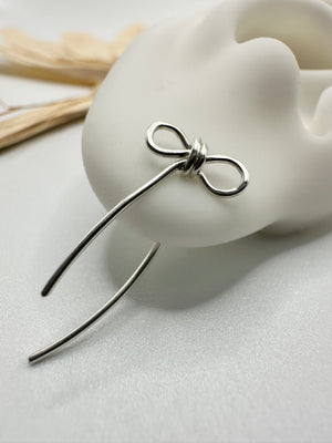 
                  
                    Sterling silver, bow threaders
                  
                