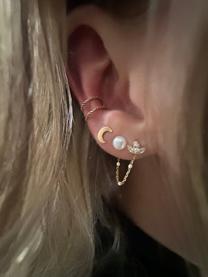 
                  
                    Gold filled conch cuff earring
                  
                
