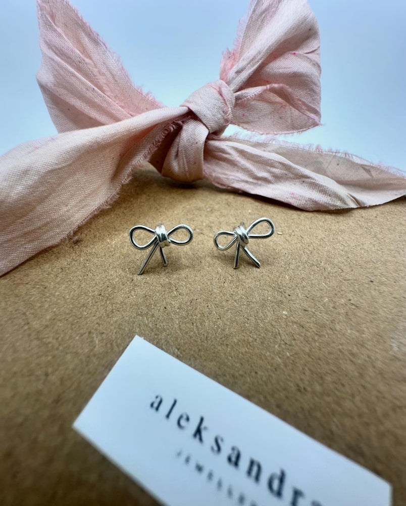 
                  
                    Sterling silver bow earrings
                  
                