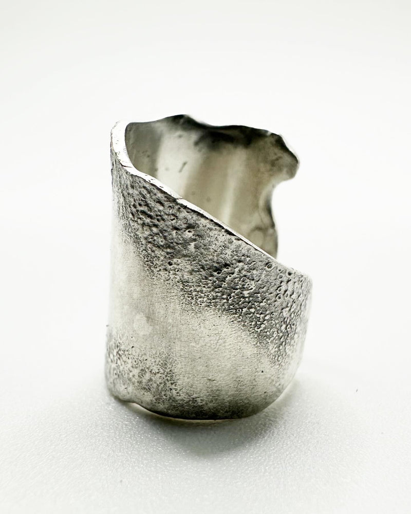 
                  
                    Sterling silver sculptural conch cuff
                  
                