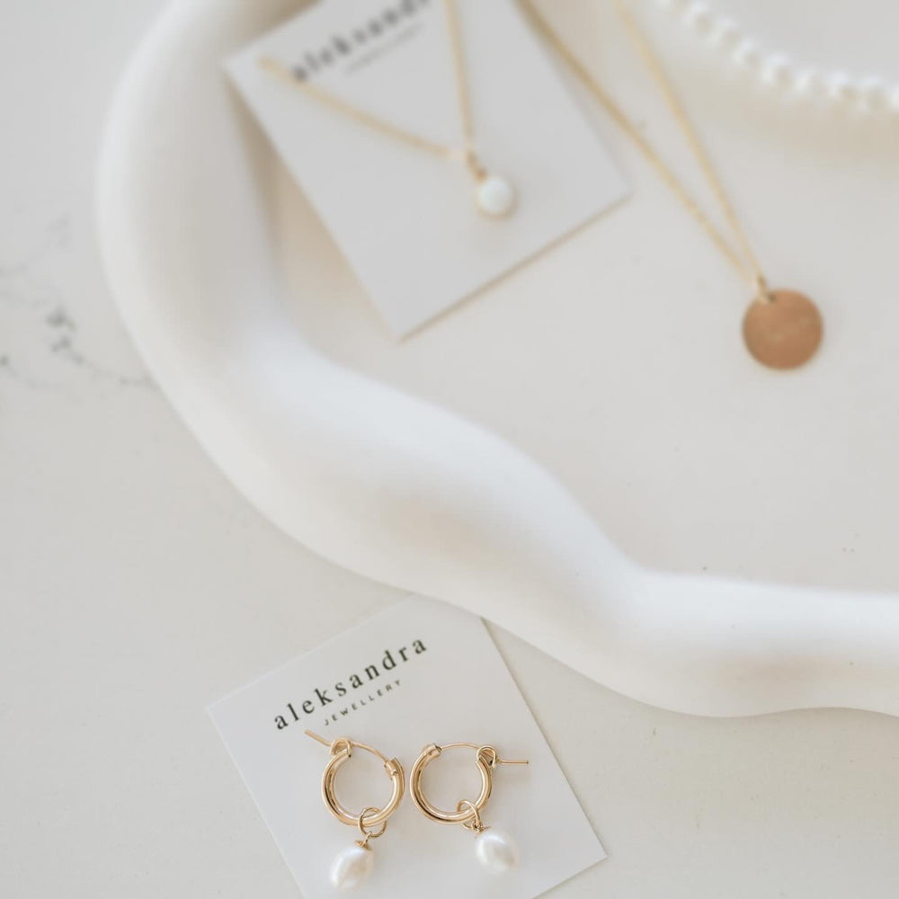 
                  
                    Gold Filled Pearl Drop Earrings
                  
                