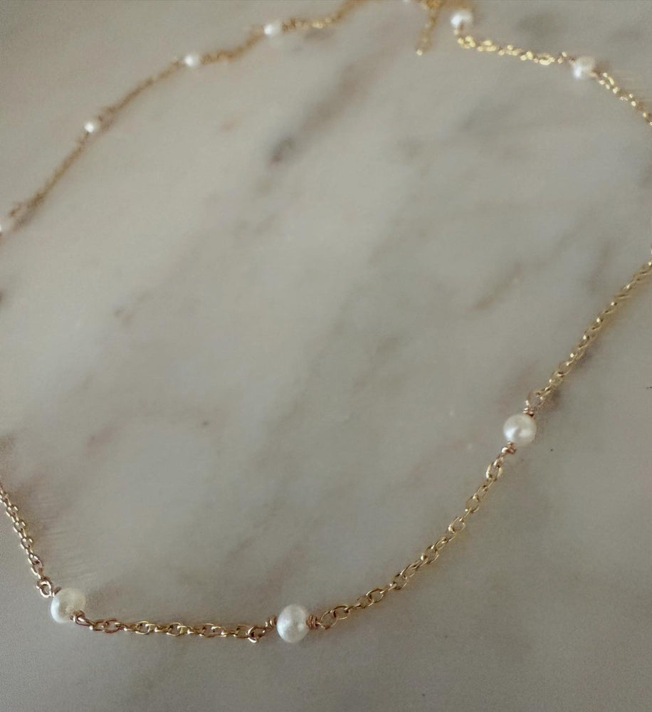 
                  
                    Pearl chain necklace
                  
                