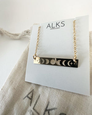 
                  
                    Gold Filled Moon Phase Bar Necklace
                  
                