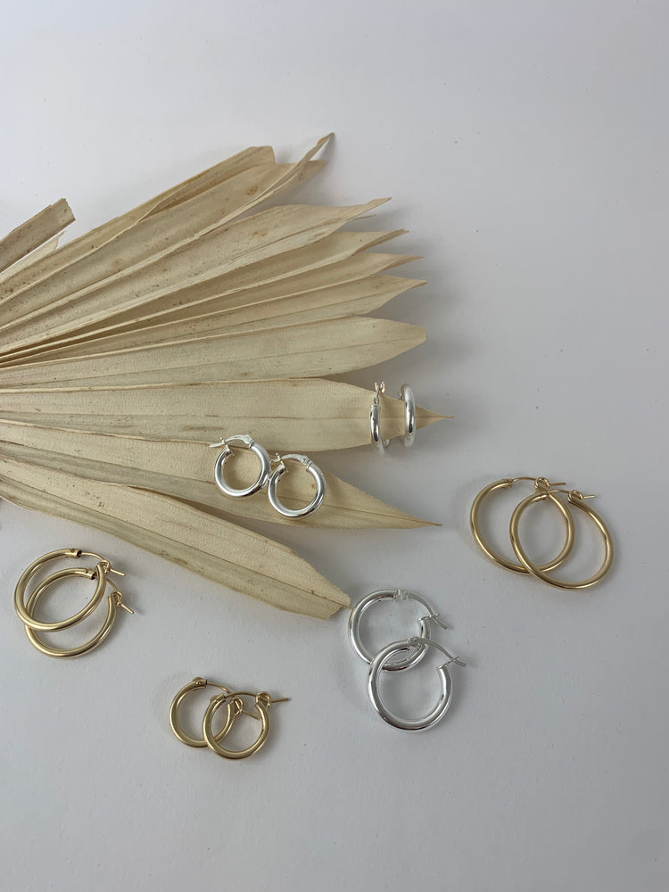 
                  
                    Gold Filled Hälō Hoop Earrings
                  
                