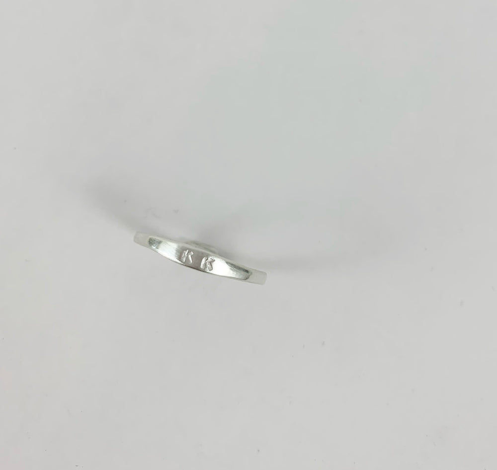 
                  
                    Sterling Silver Skinny Initial Ring
                  
                